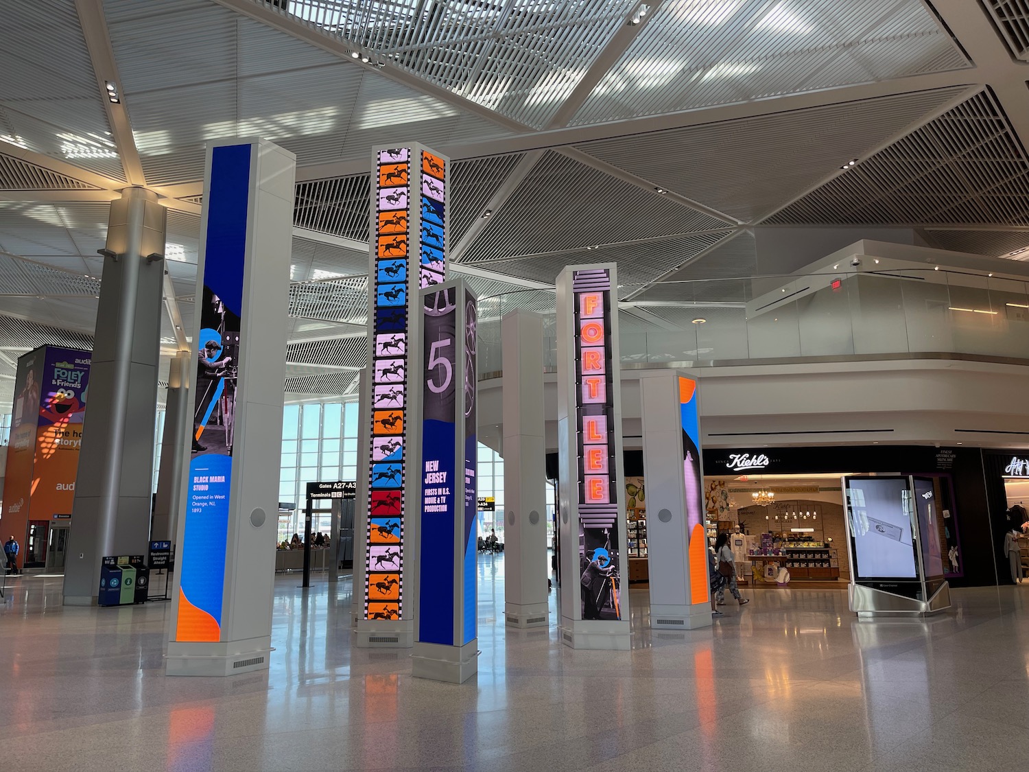 a group of tall pillars in a building