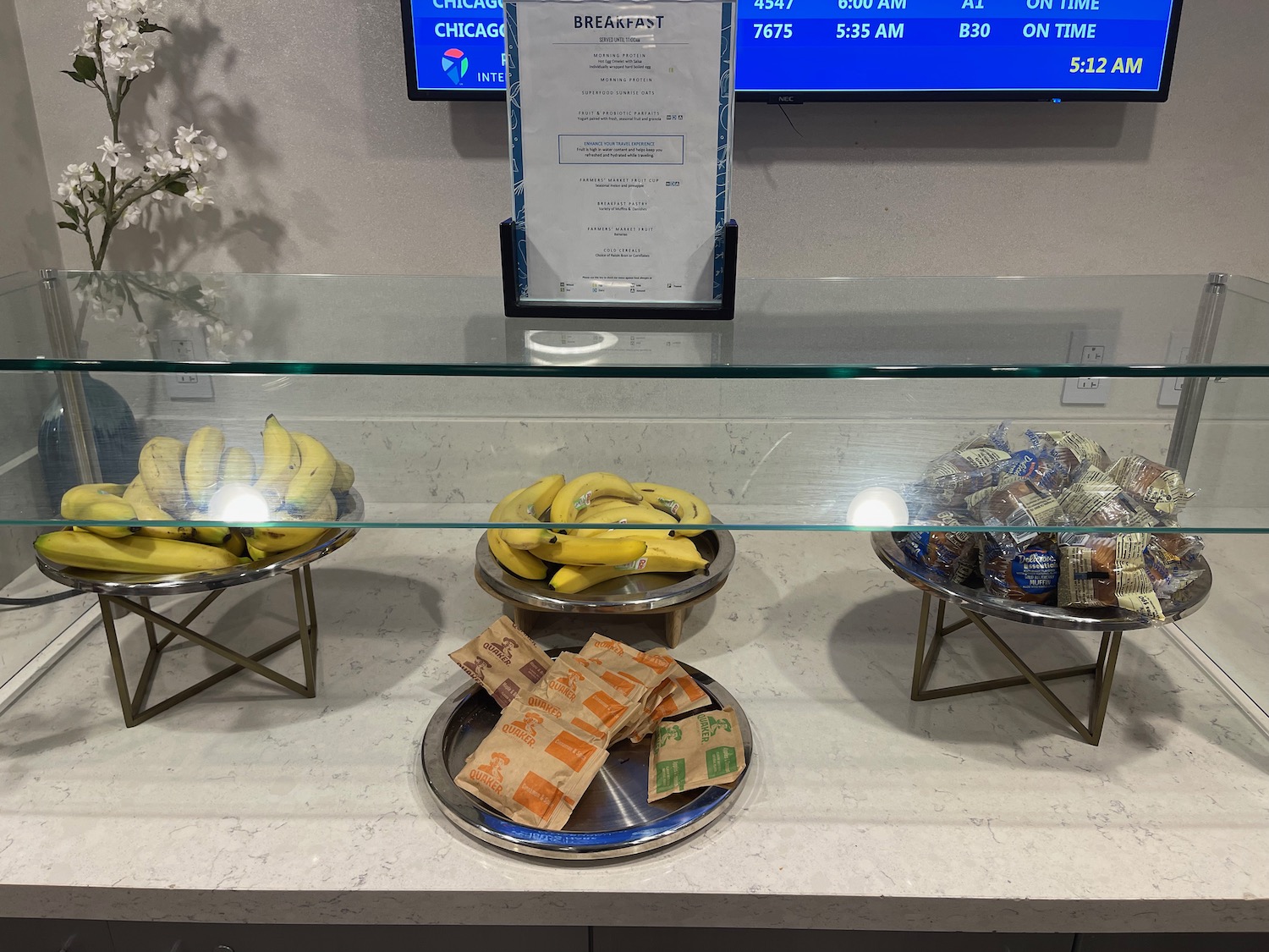 a display case with bananas and candy