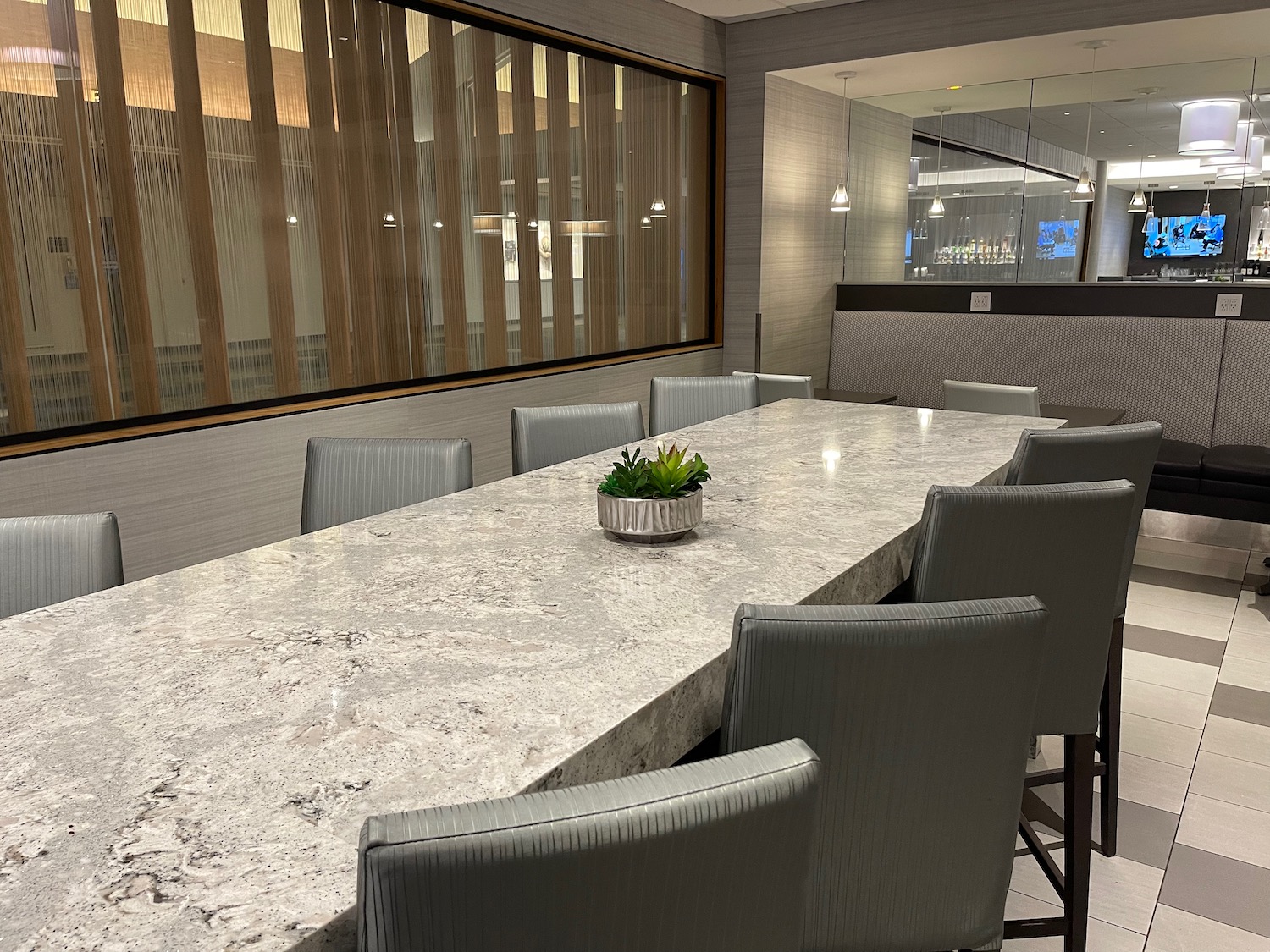 a table with chairs in a room