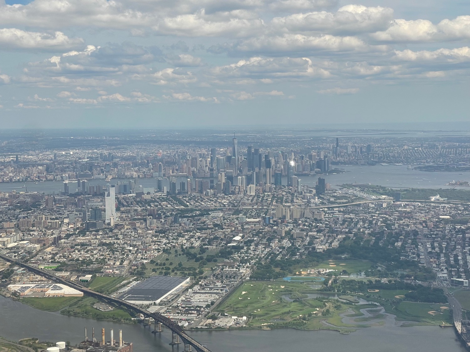 a city with a bridge and a body of water