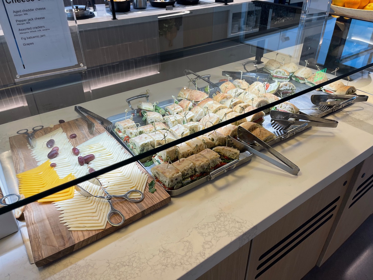 a buffet with sandwiches and cheese