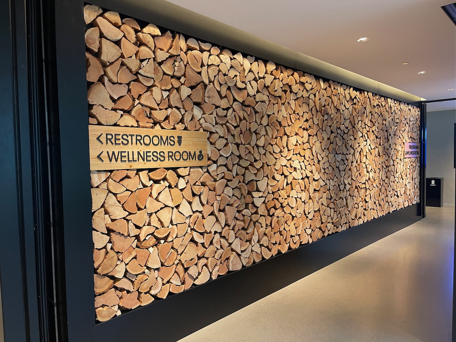 a wall of wood stacked in a room