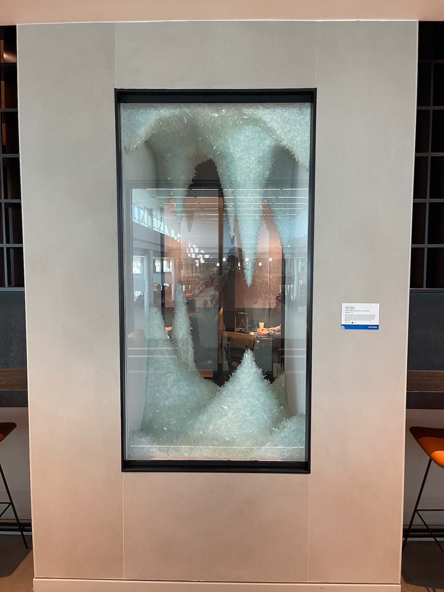 a glass window with ice crystals on it