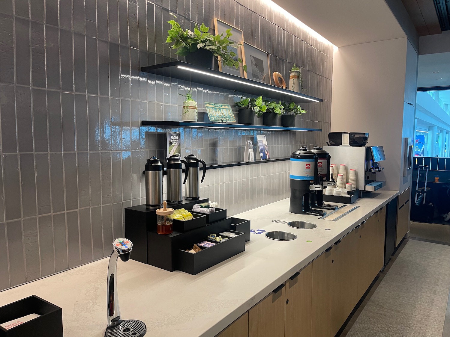 a coffee machine and coffee maker on a counter