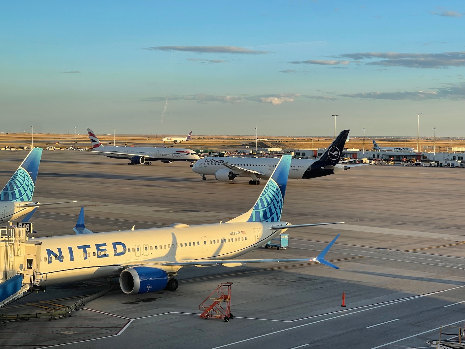 airplanes parked on a runway