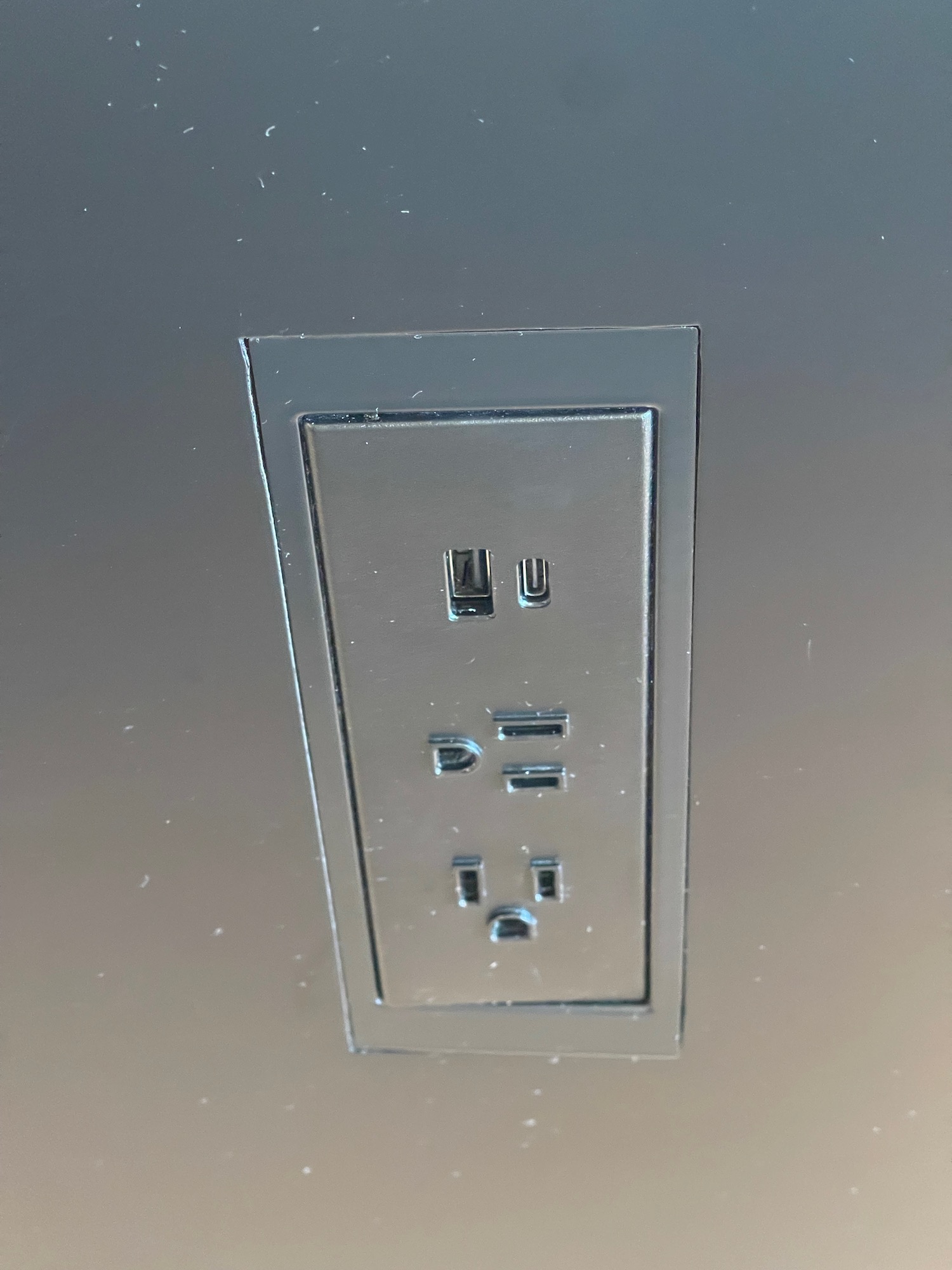 a close up of a wall outlet