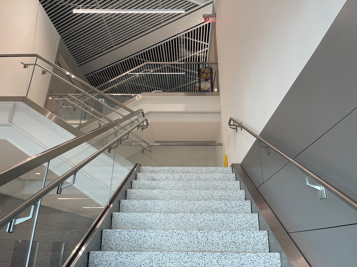 a staircase with metal railings