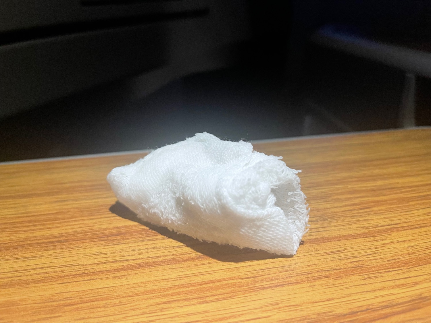 a white gauze on a wood surface