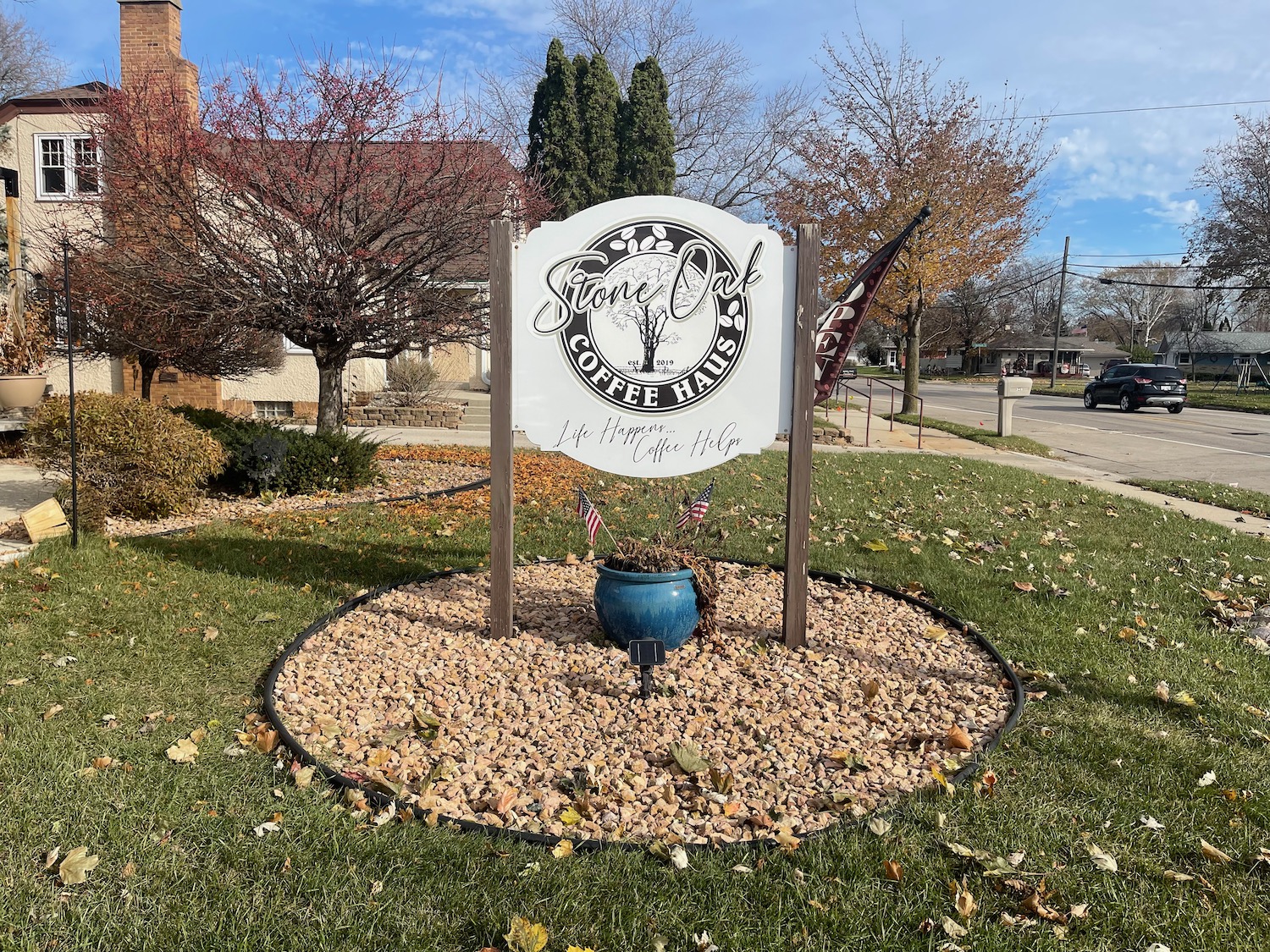 a sign in a garden