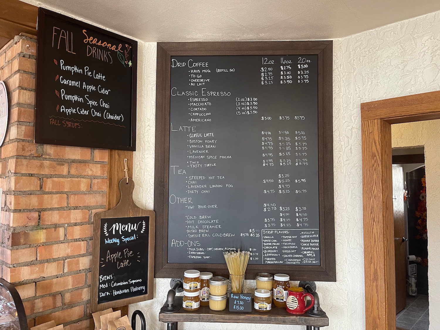 a menu board with writing on it