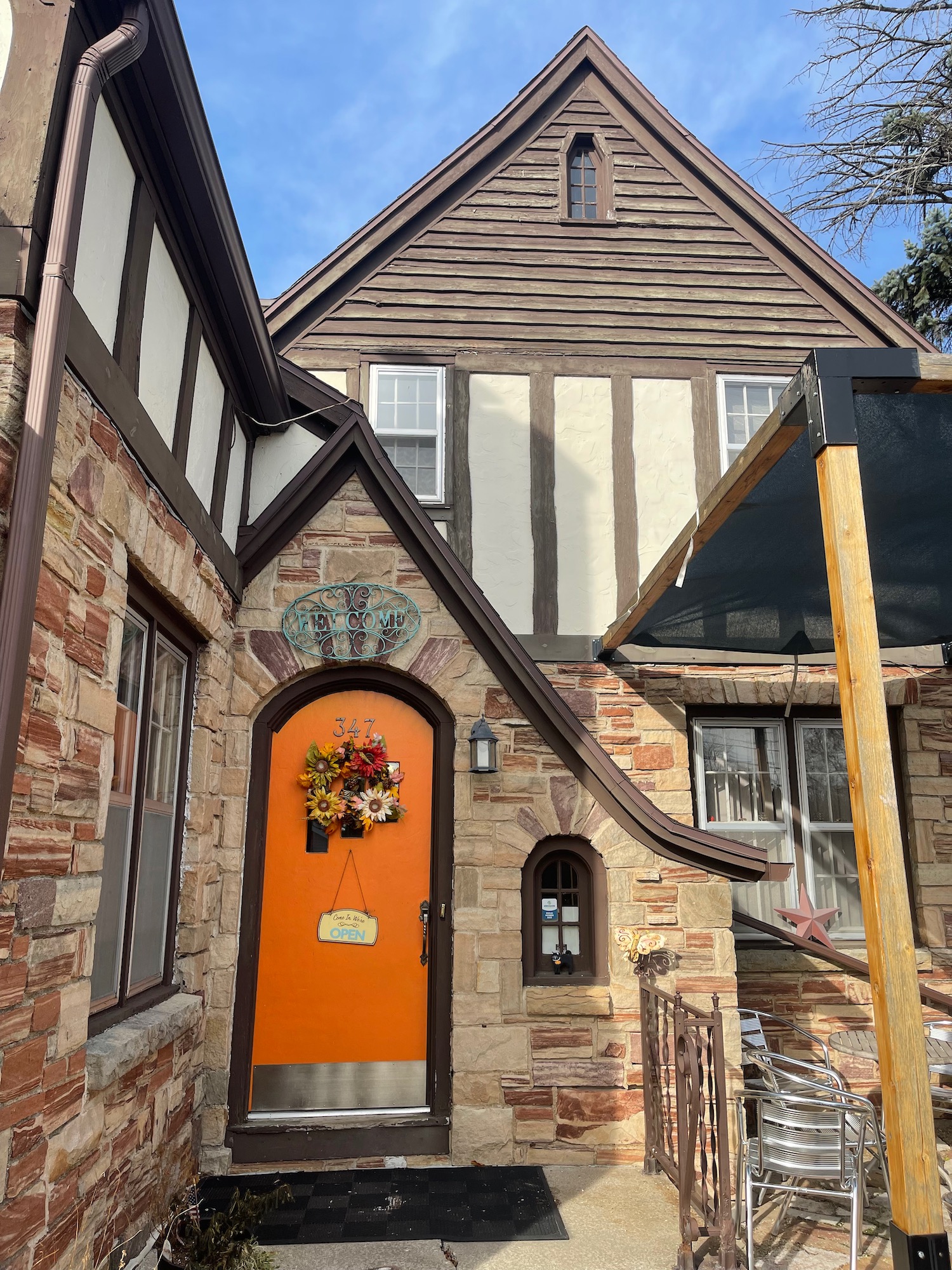 a house with a door and a wreath