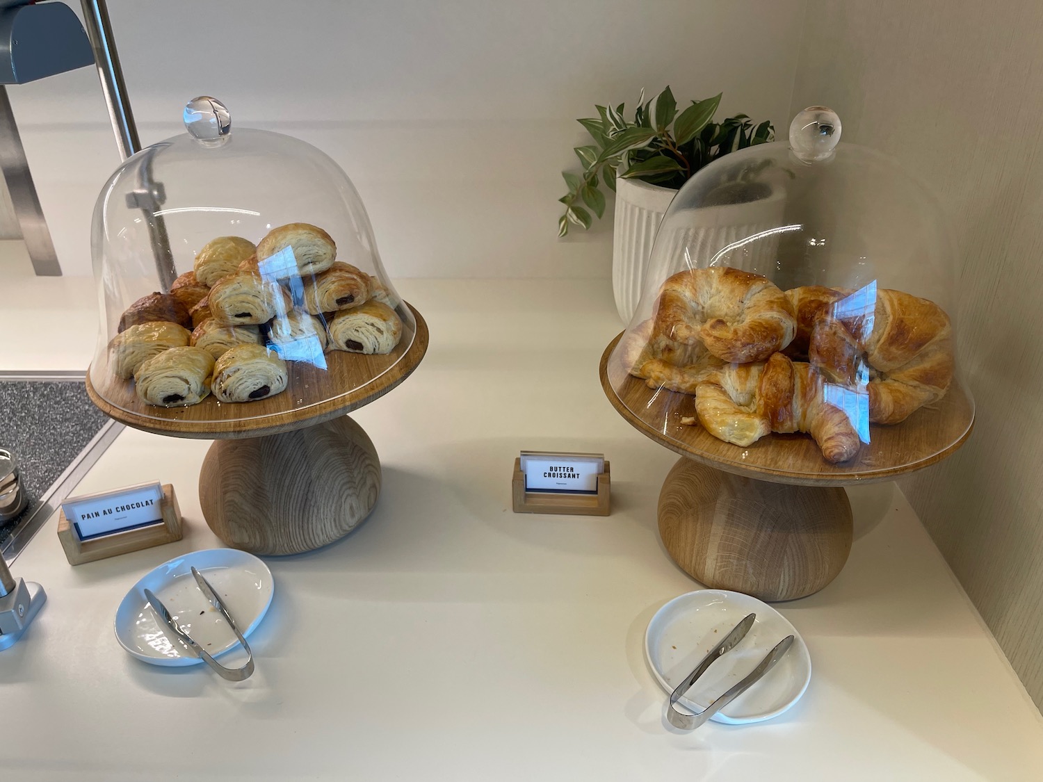 a table with pastries and plates