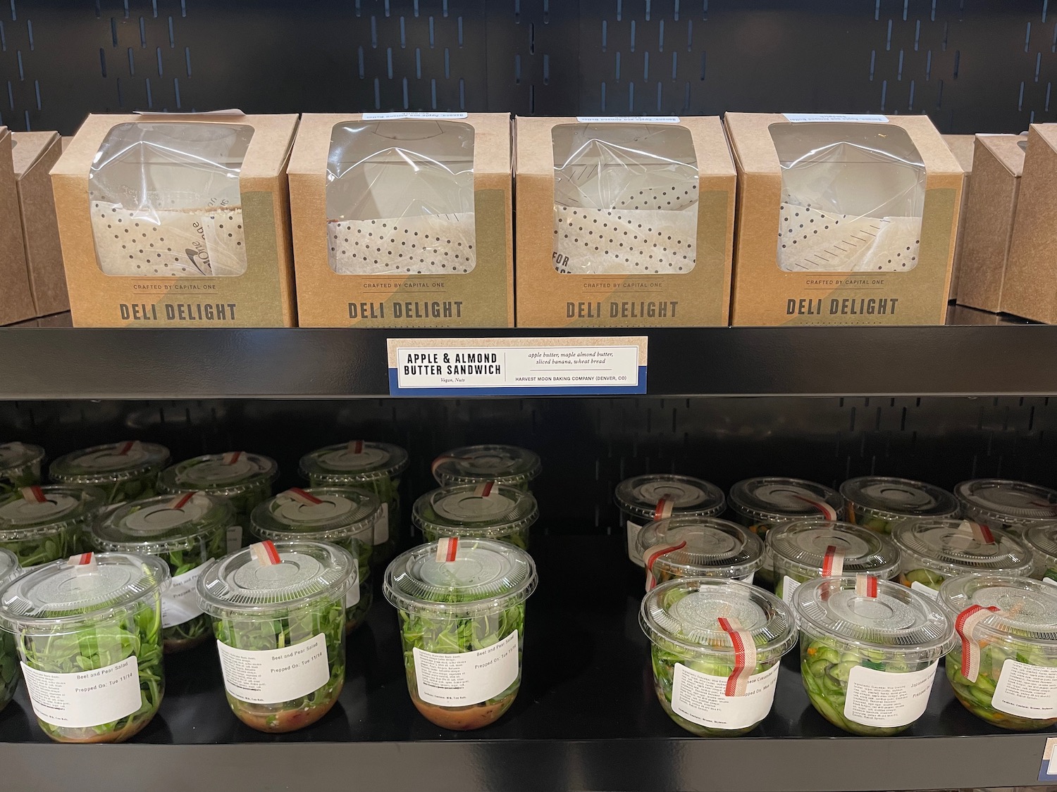 a shelf with containers of food