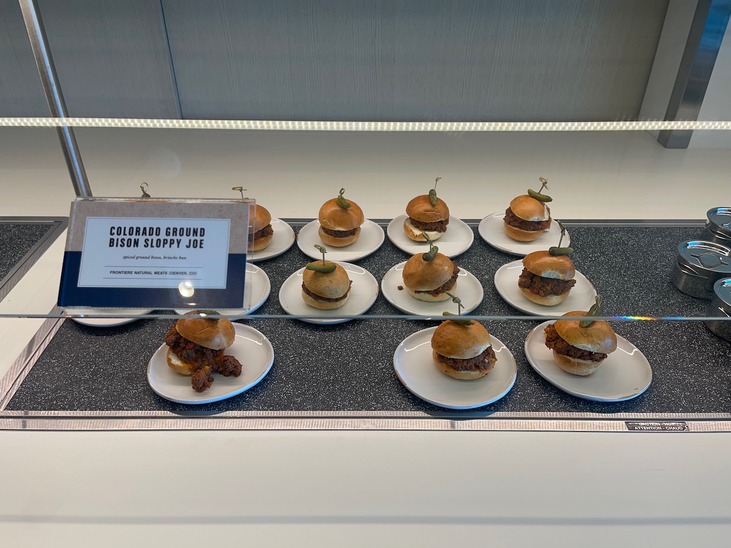 a display of small sandwiches