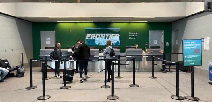 people standing in front of a counter