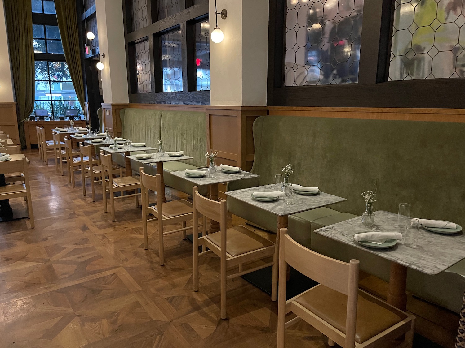 a restaurant with tables and chairs