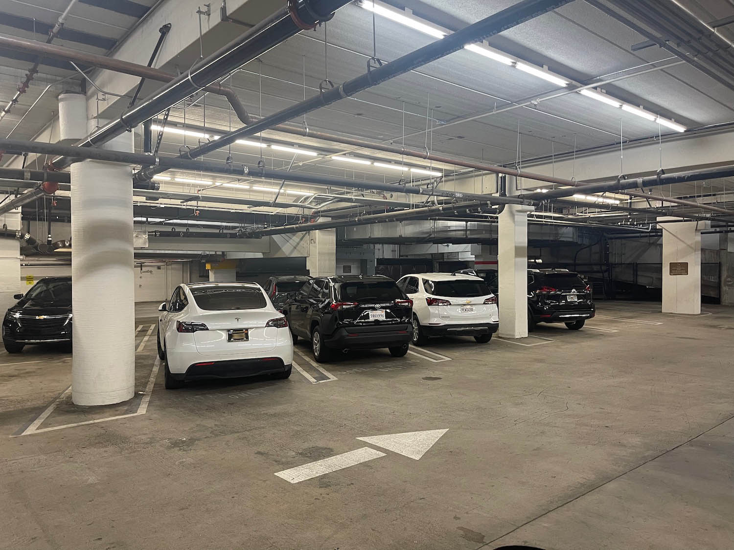 a group of cars in a parking garage