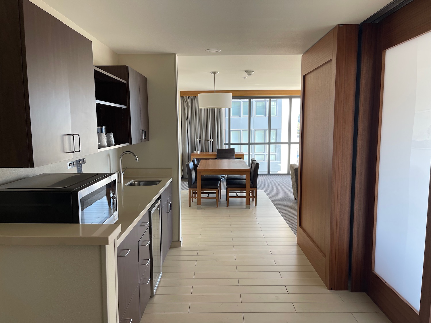 a kitchen and dining area in a hotel