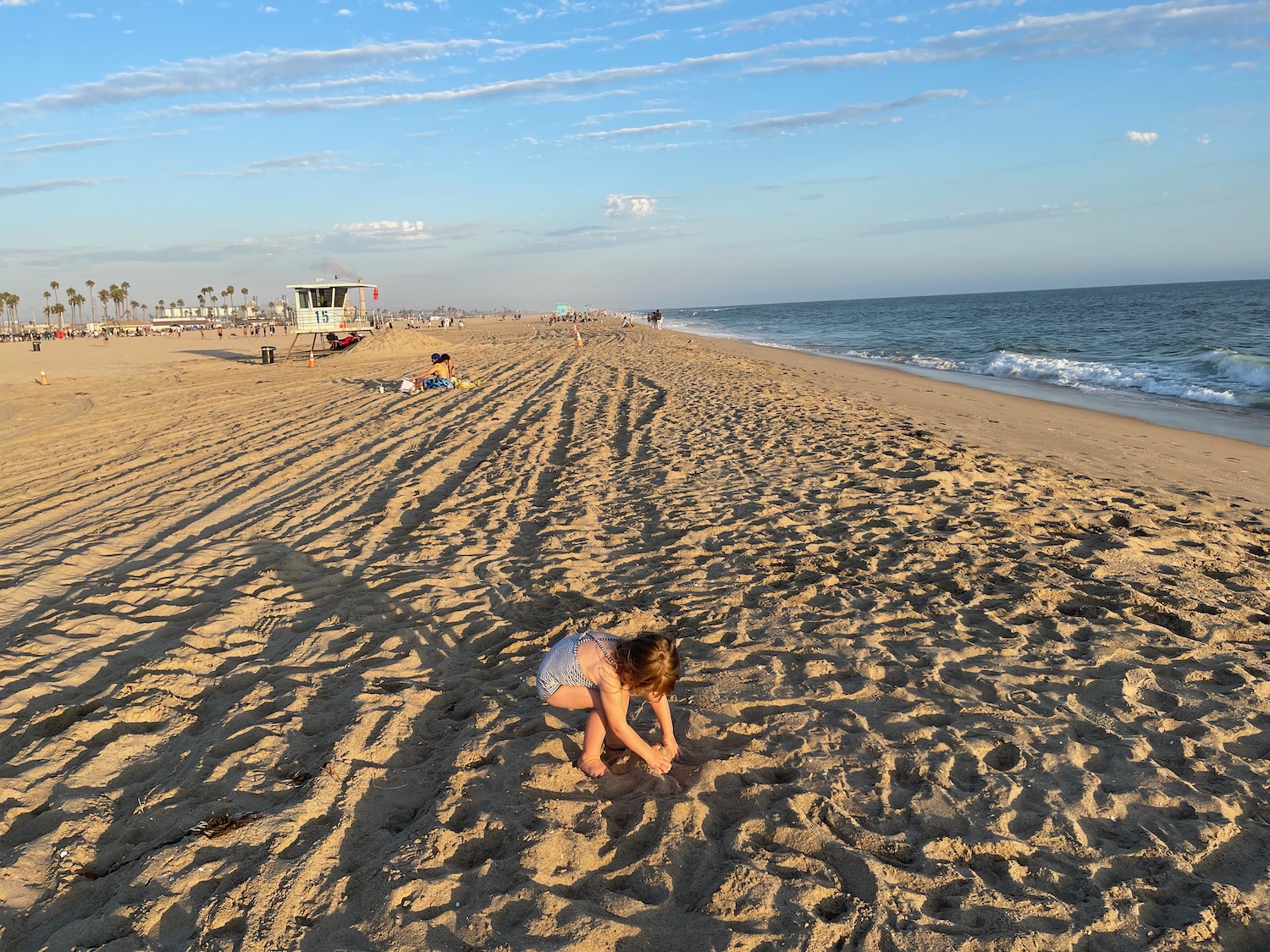 a child playing in the sand