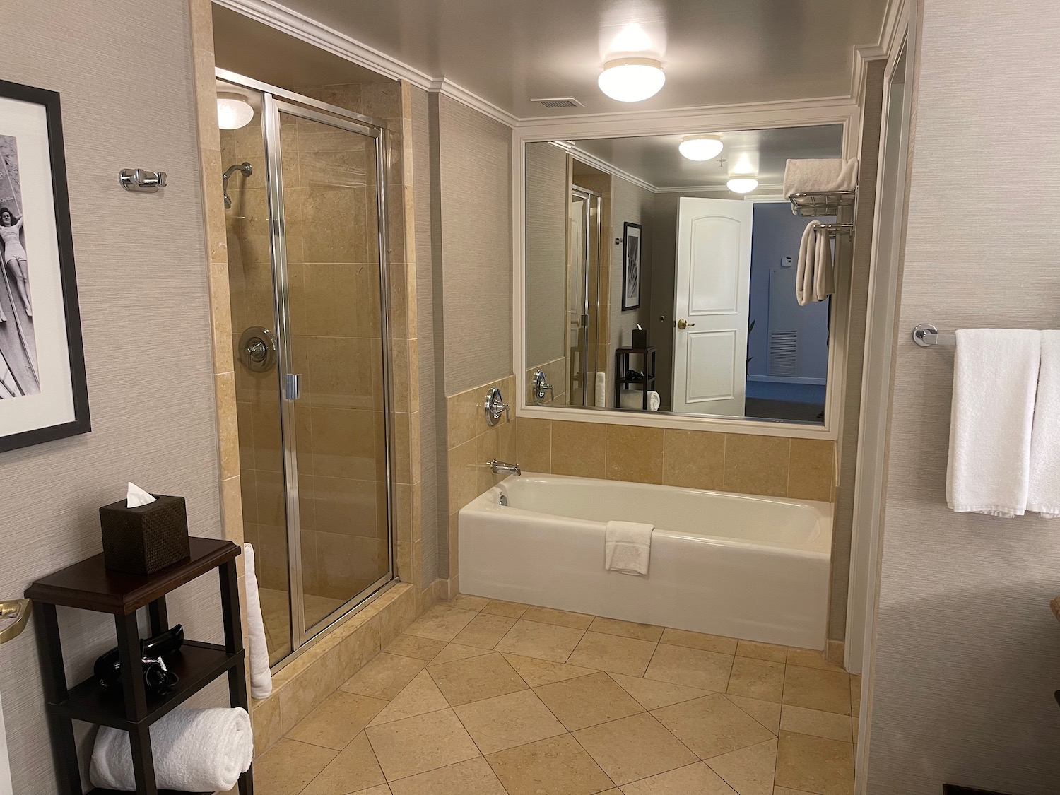 a bathroom with a shower and bathtub