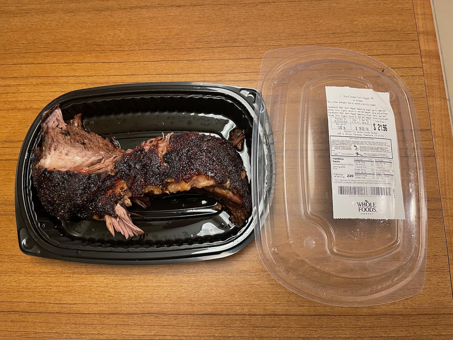 a piece of meat in a plastic container