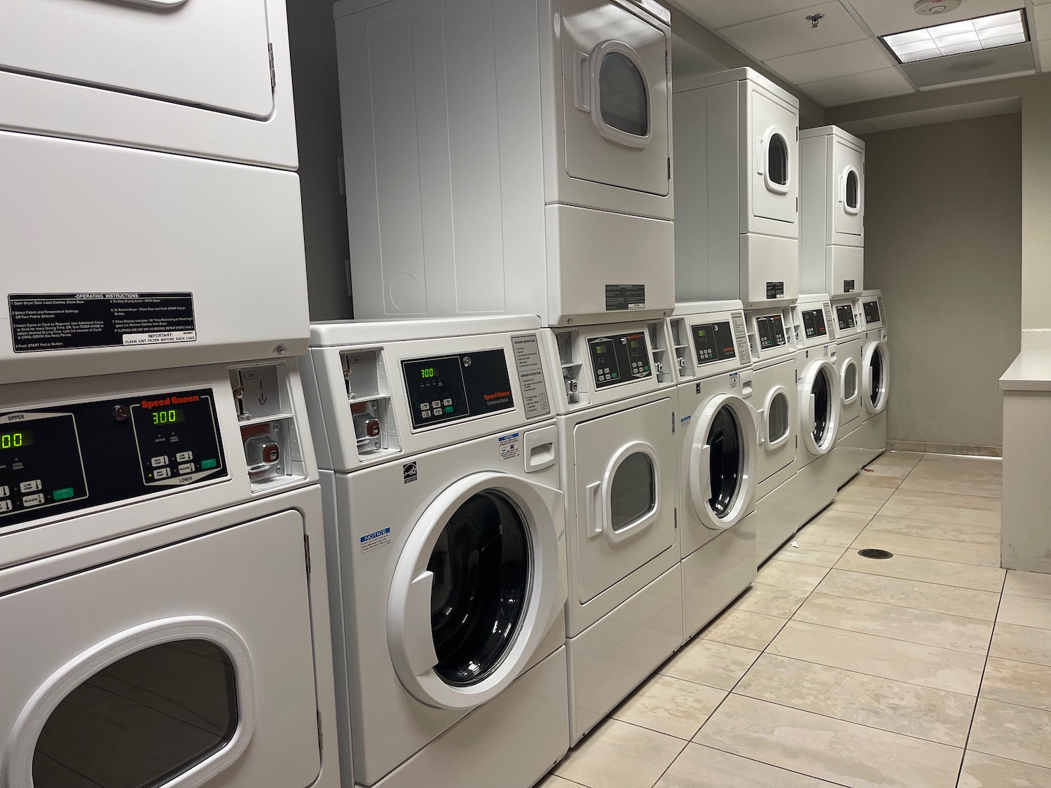 a row of white washing machines