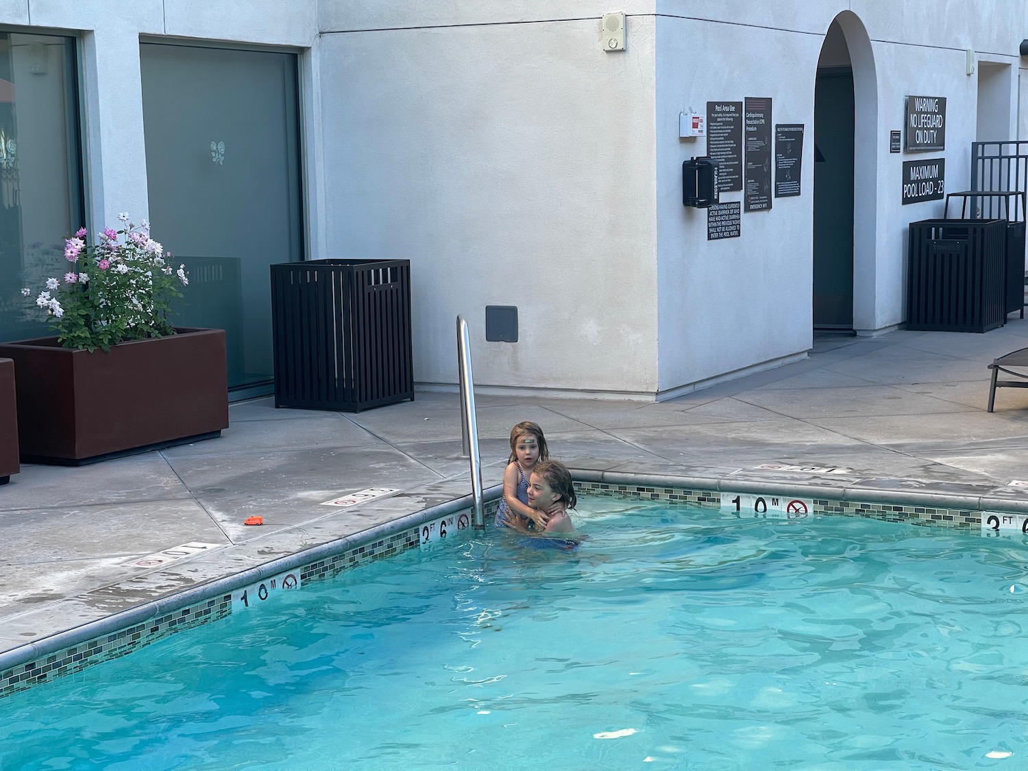 a two children in a pool