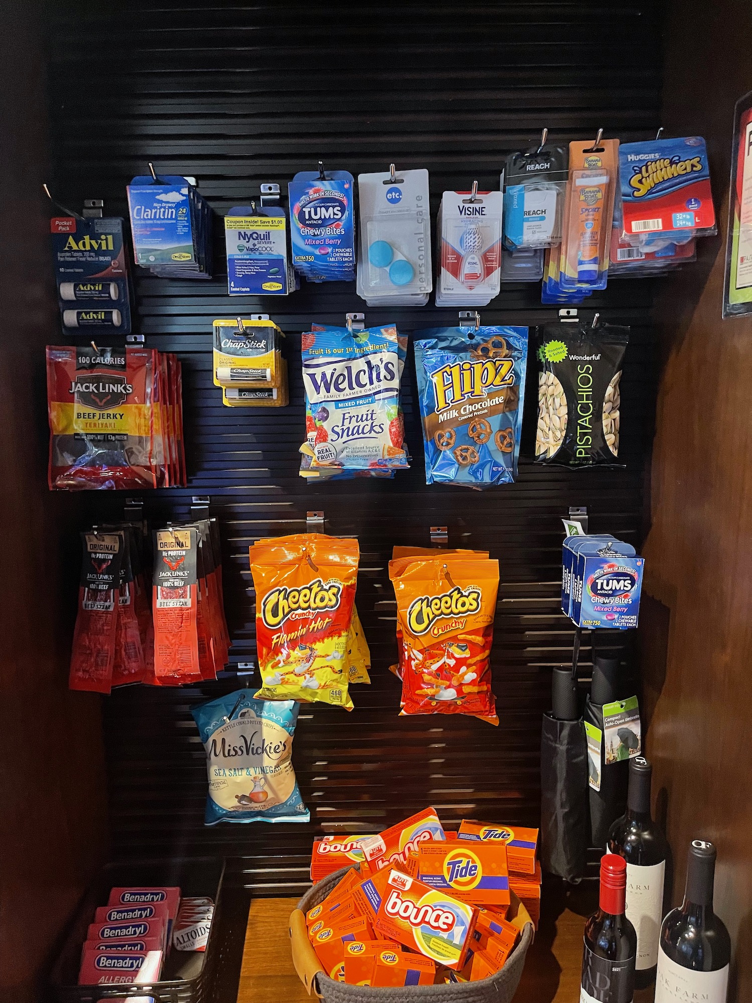a shelf with various snacks and drinks