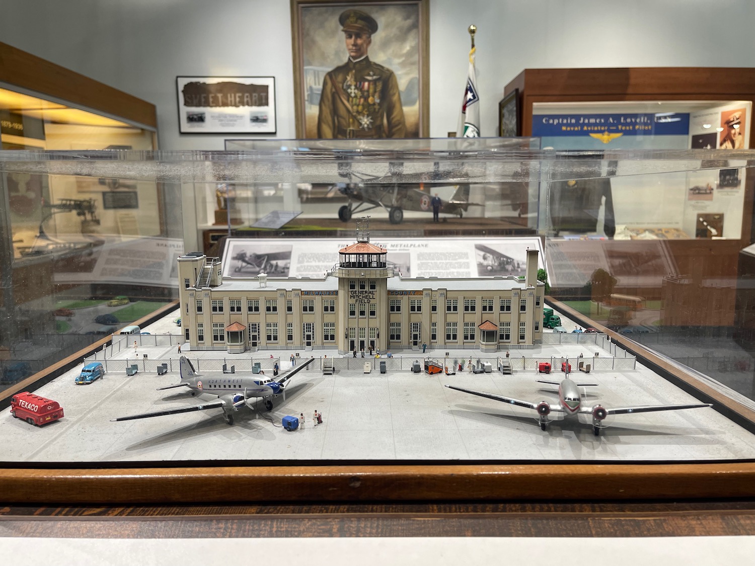 a model of an airplane in a glass case