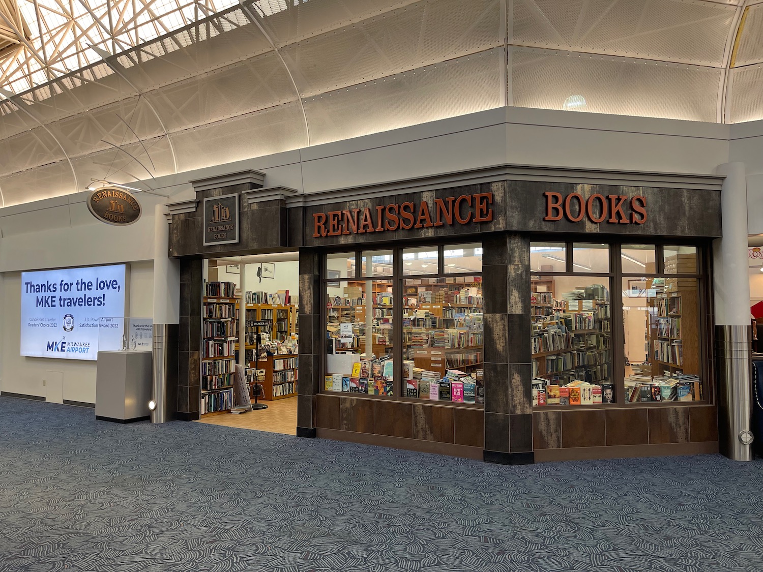 a storefront with a book store in the middle