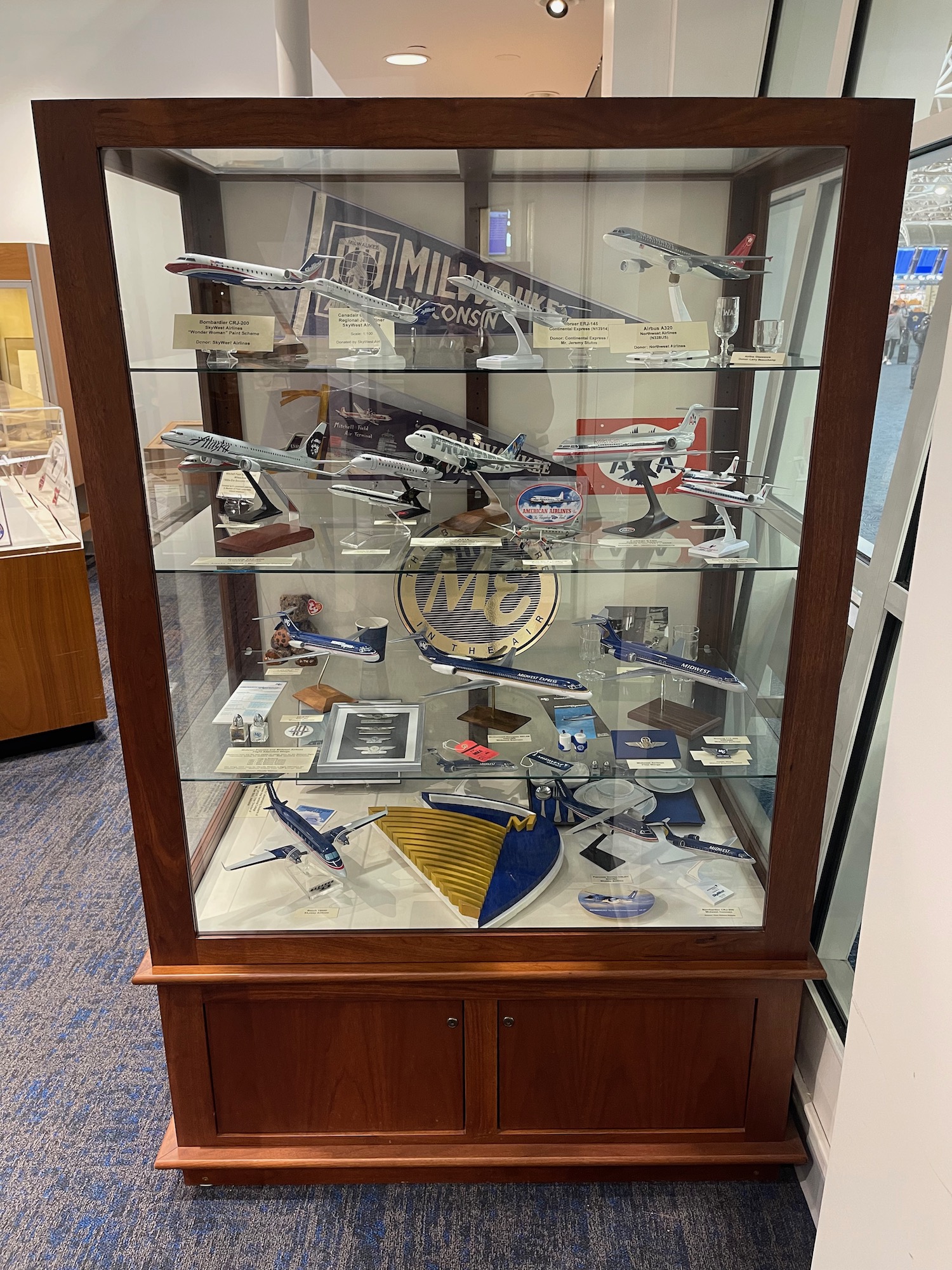 a display case with model airplanes