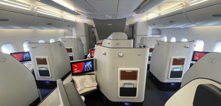 an airplane with seats and a tv