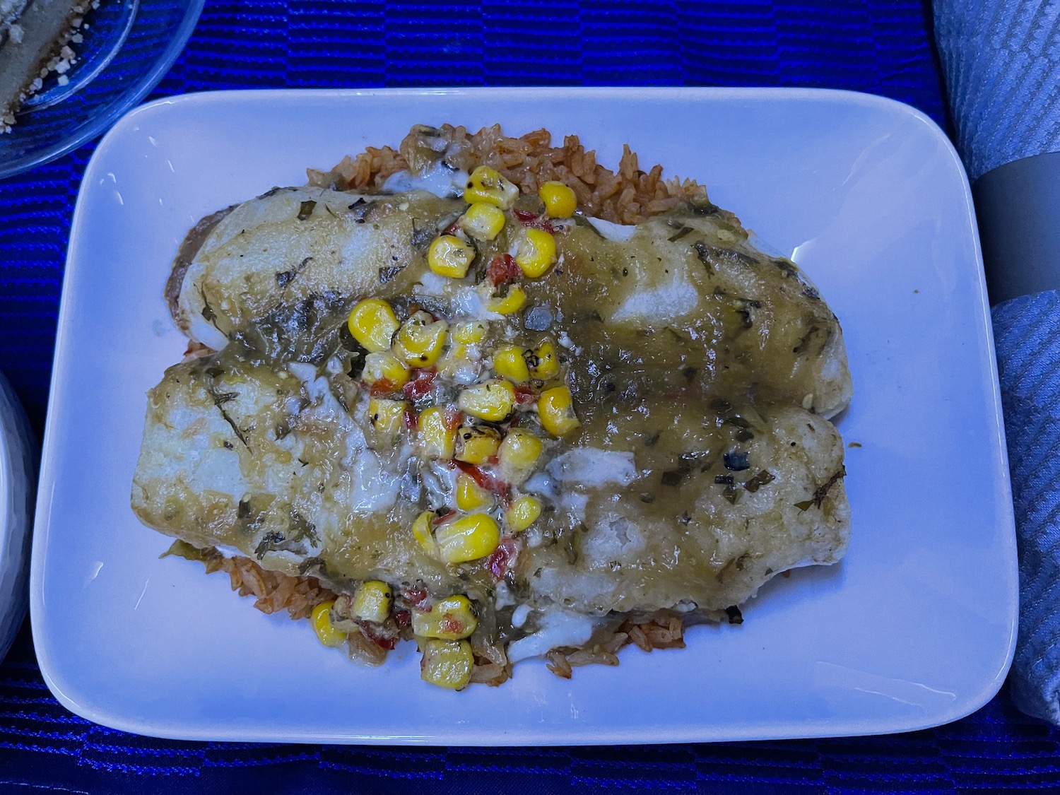 a plate of food on a blue surface