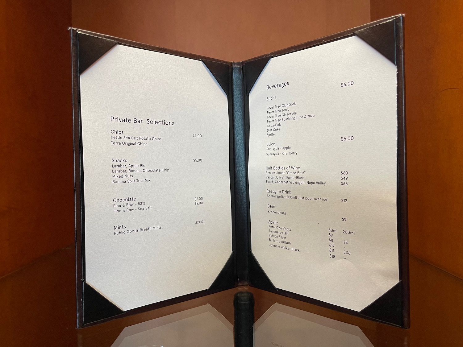 a menu with a black and white cover