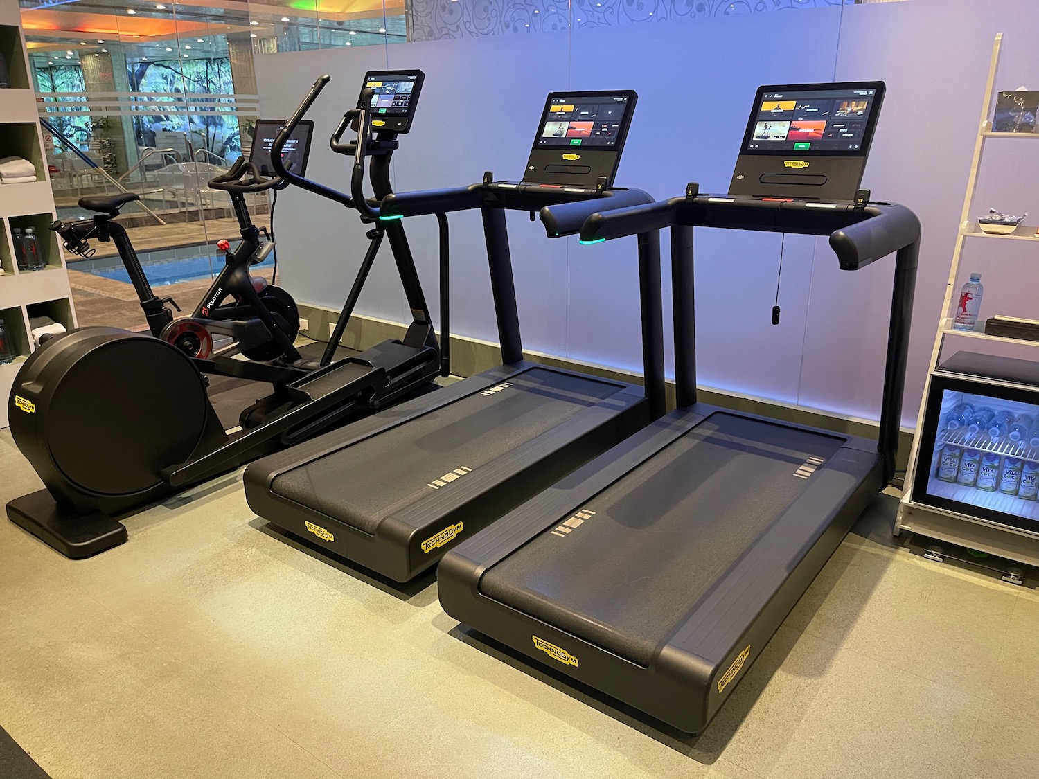 a group of treadmills in a room