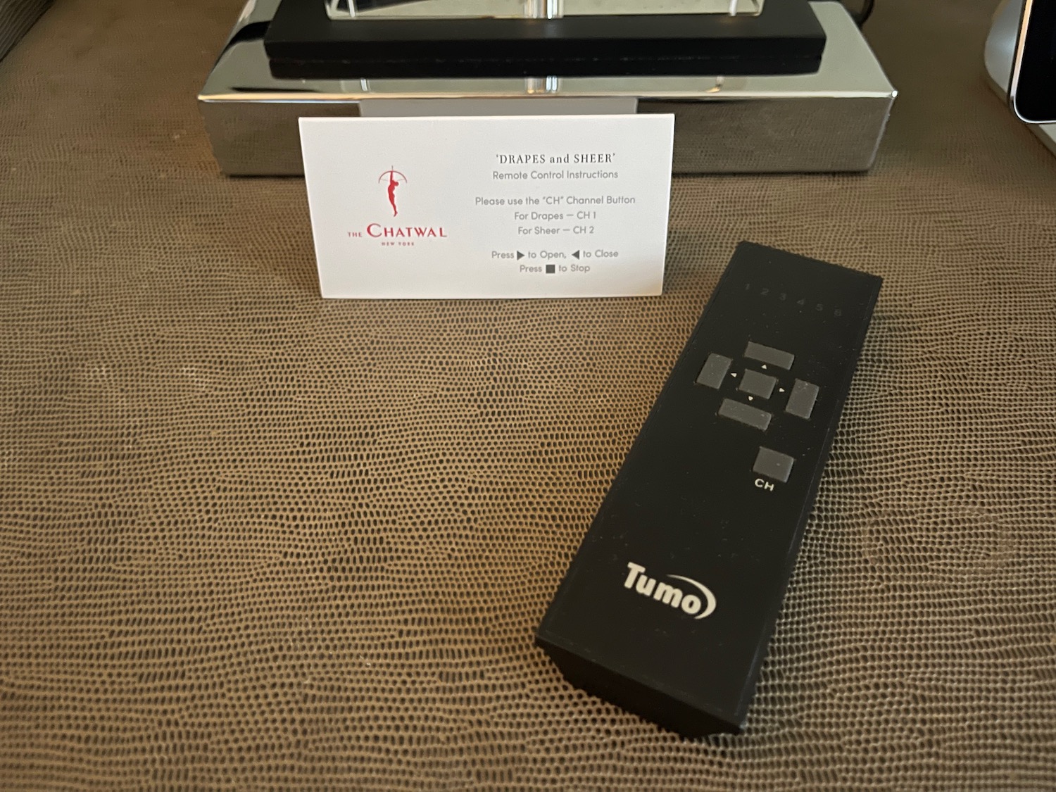 a remote control and a card