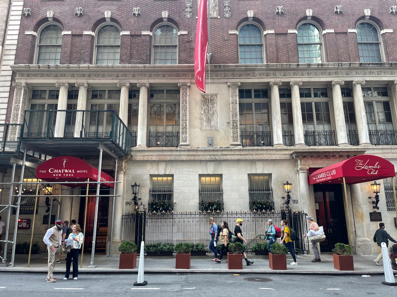 a group of people outside of a building