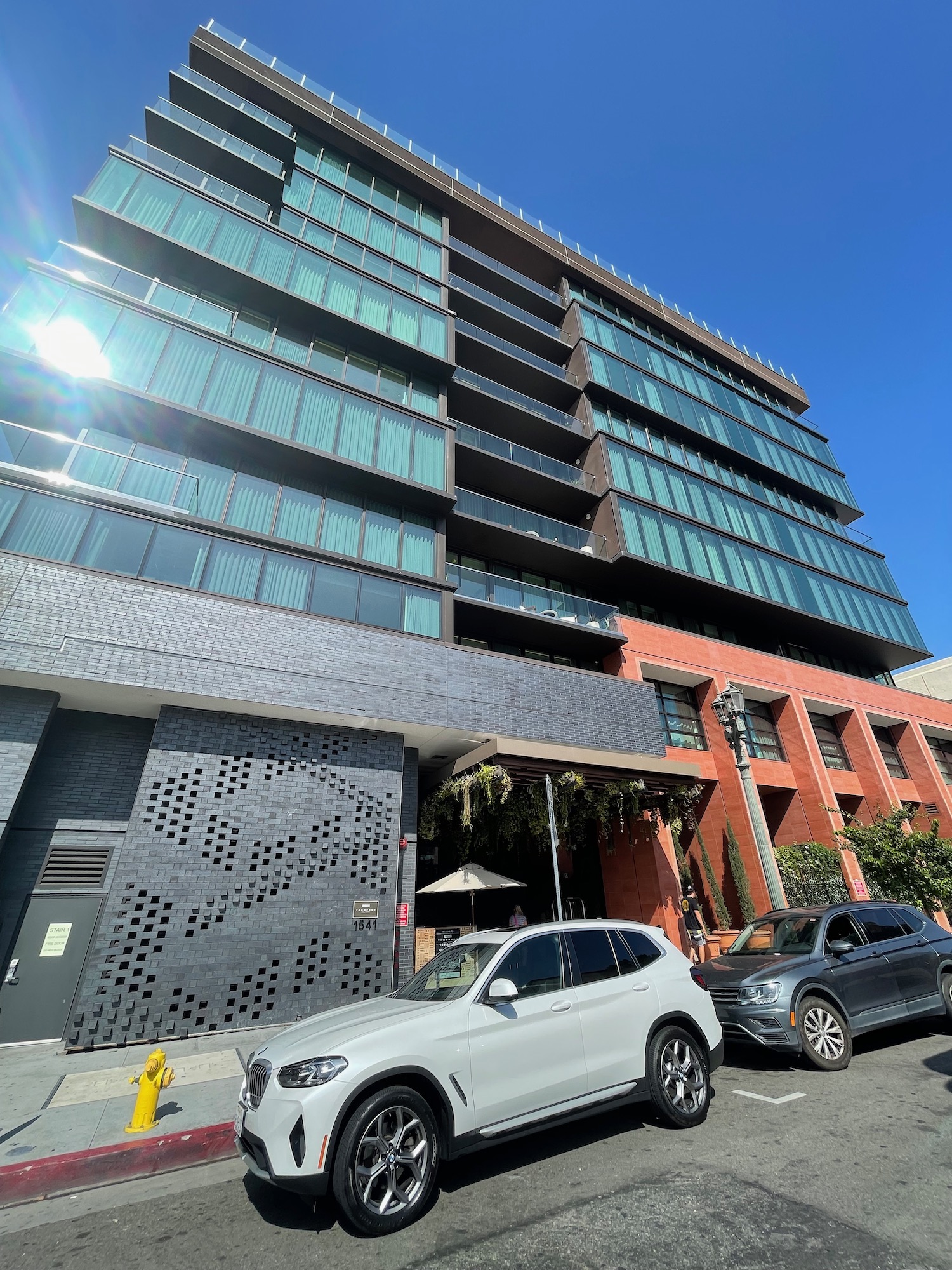 a building with cars parked in front of it