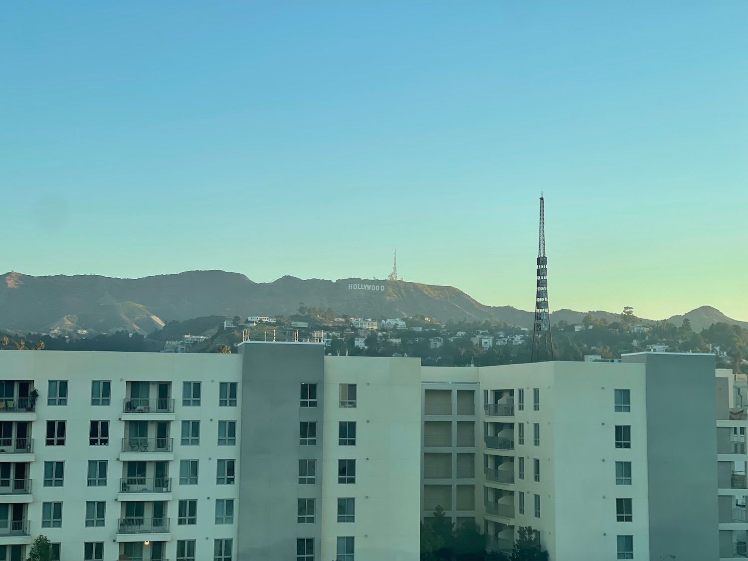 a building with a tower in the background