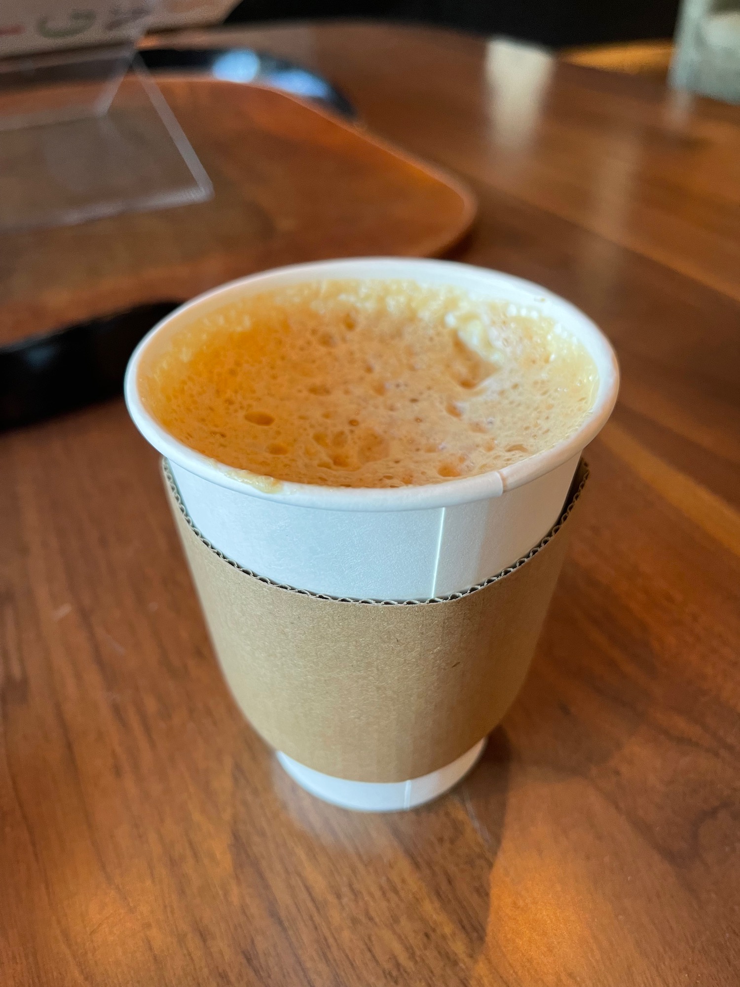 a cup of coffee on a table