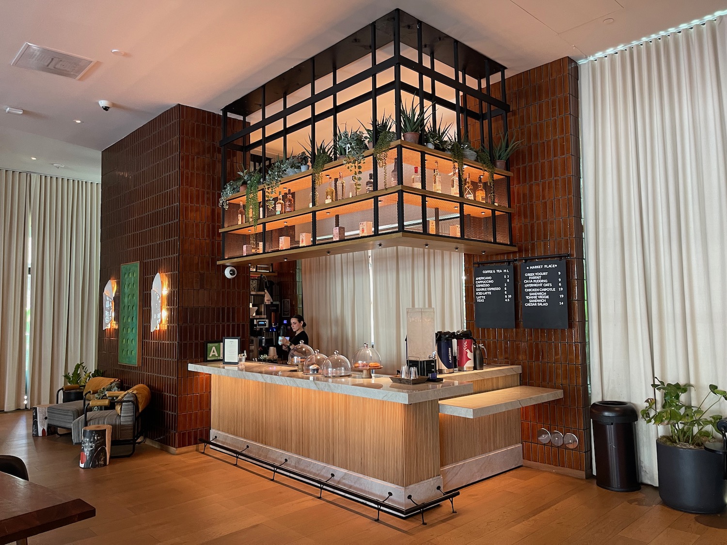 a bar with a counter and a shelf