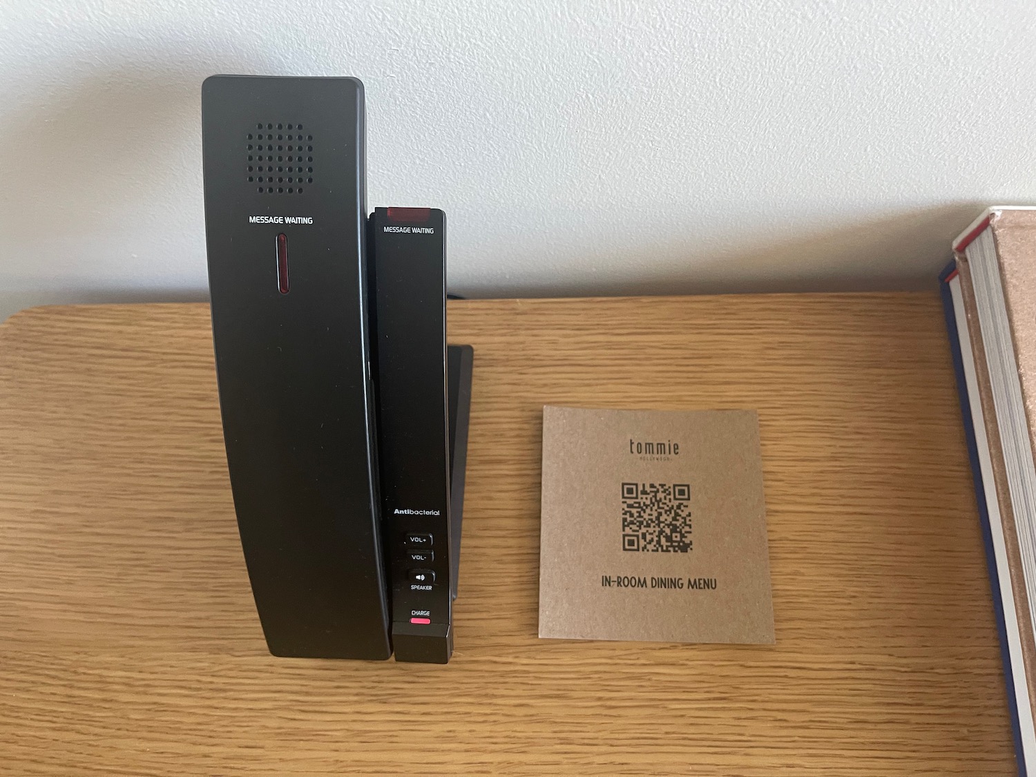 a black telephone on a table