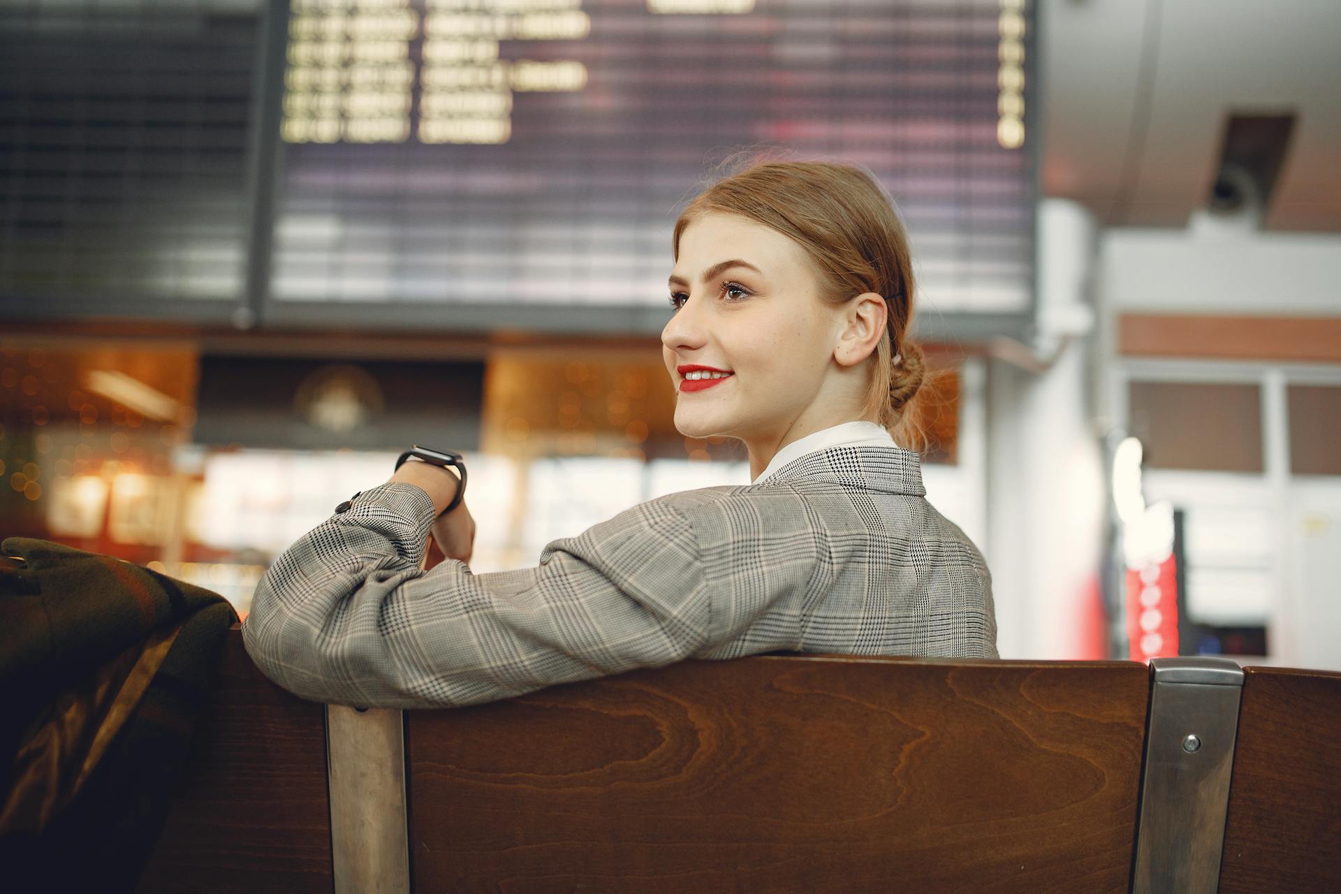 a woman sitting on a bench