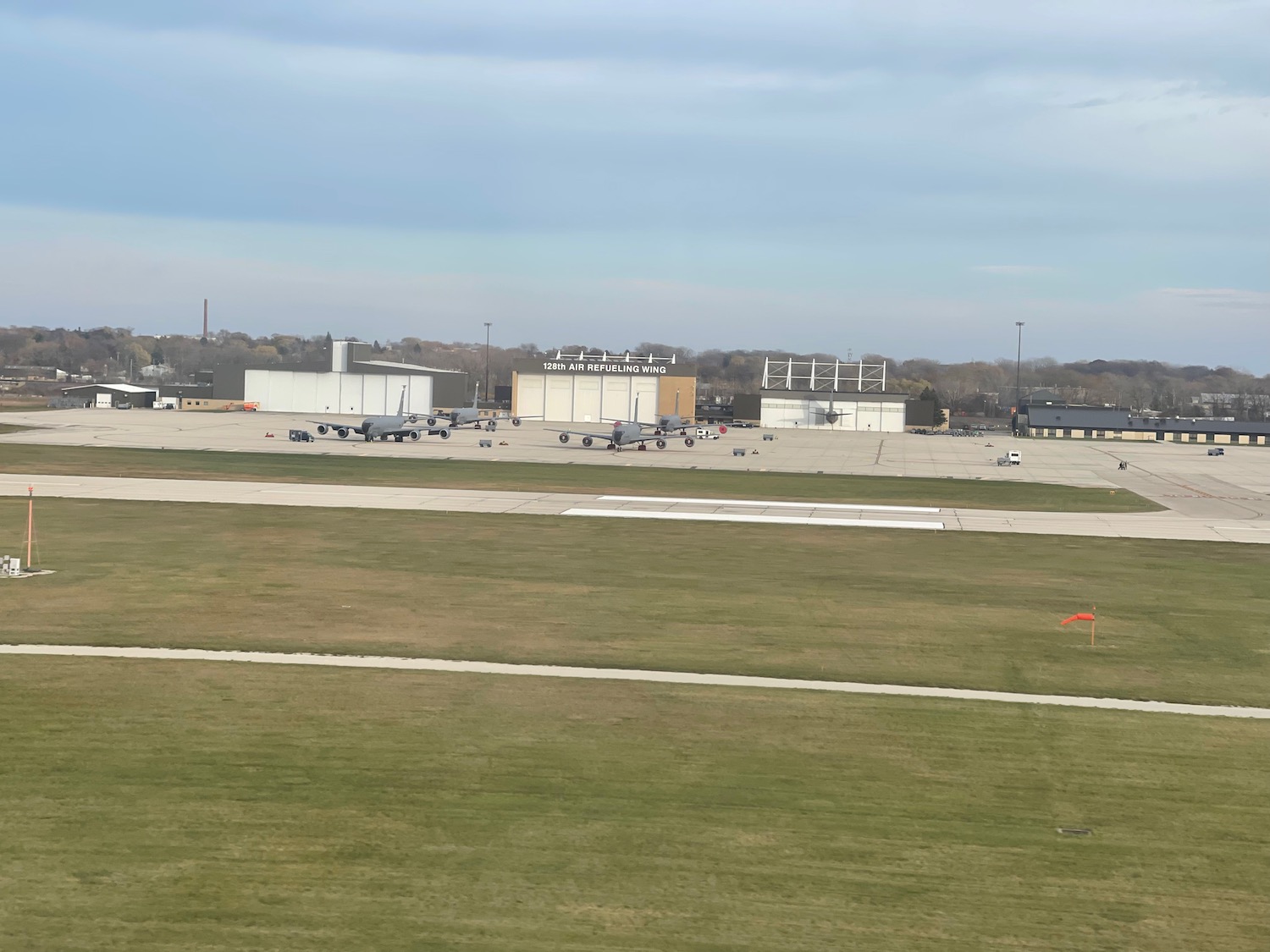 an airport with planes on the runway