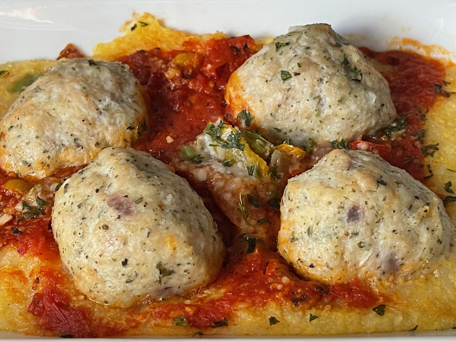 a plate of food with meatballs on it