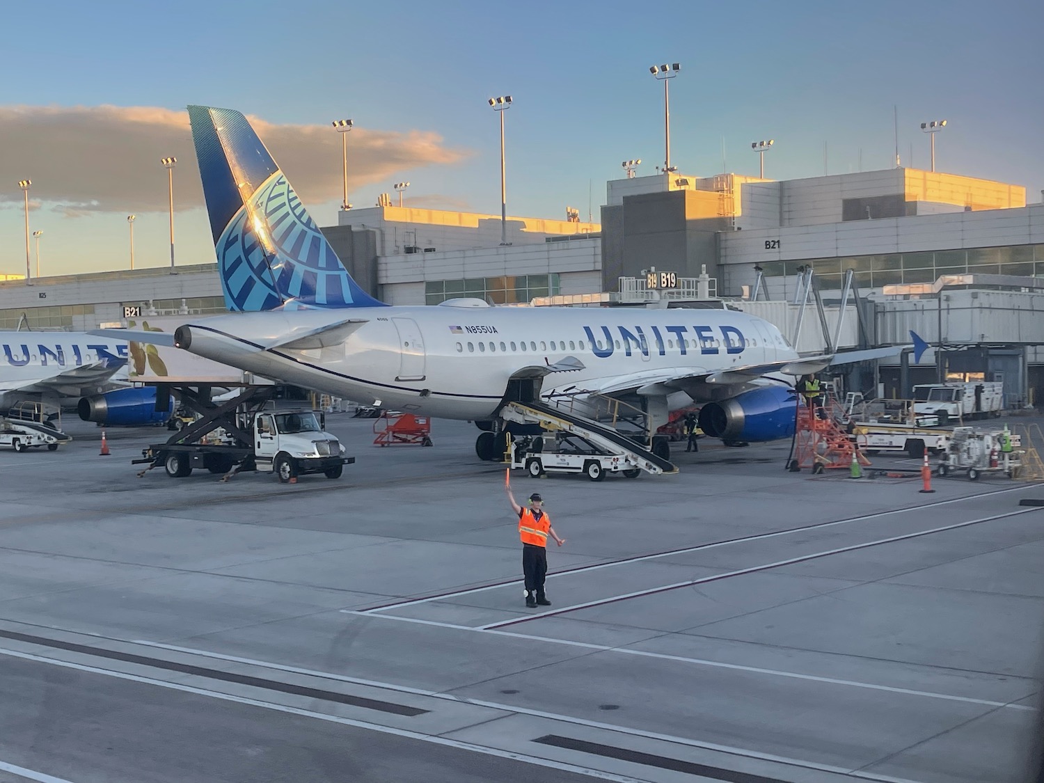 a man standing next to an airplane