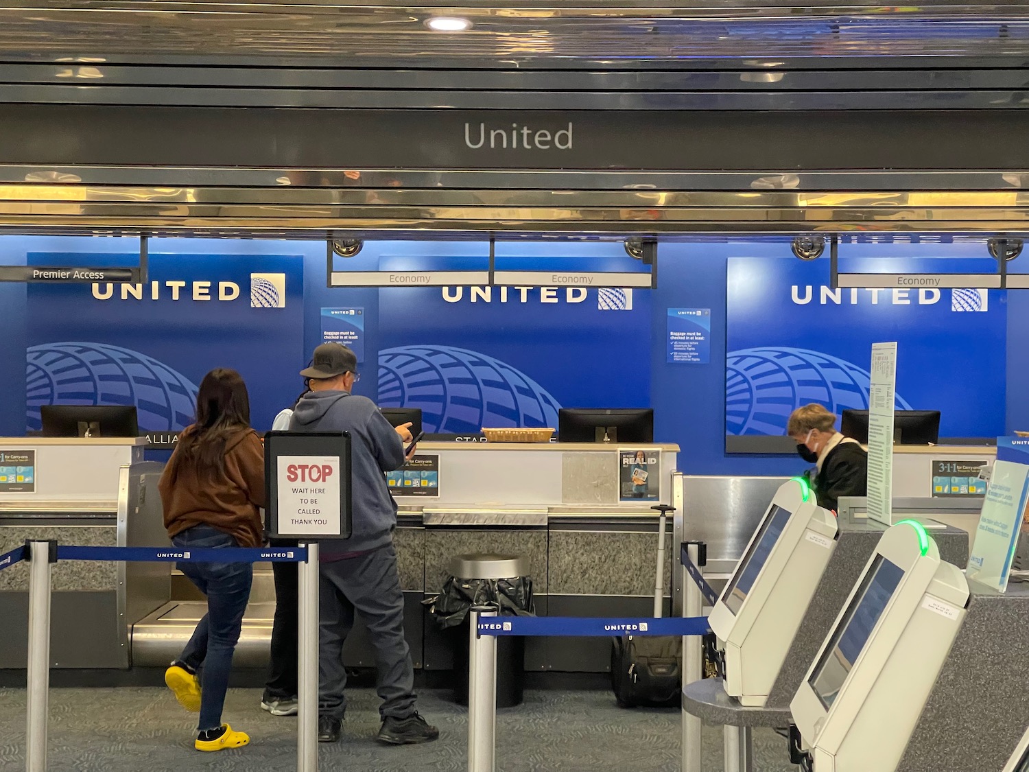 people standing in front of a counter