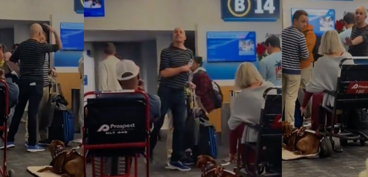 a man standing in a room with luggage