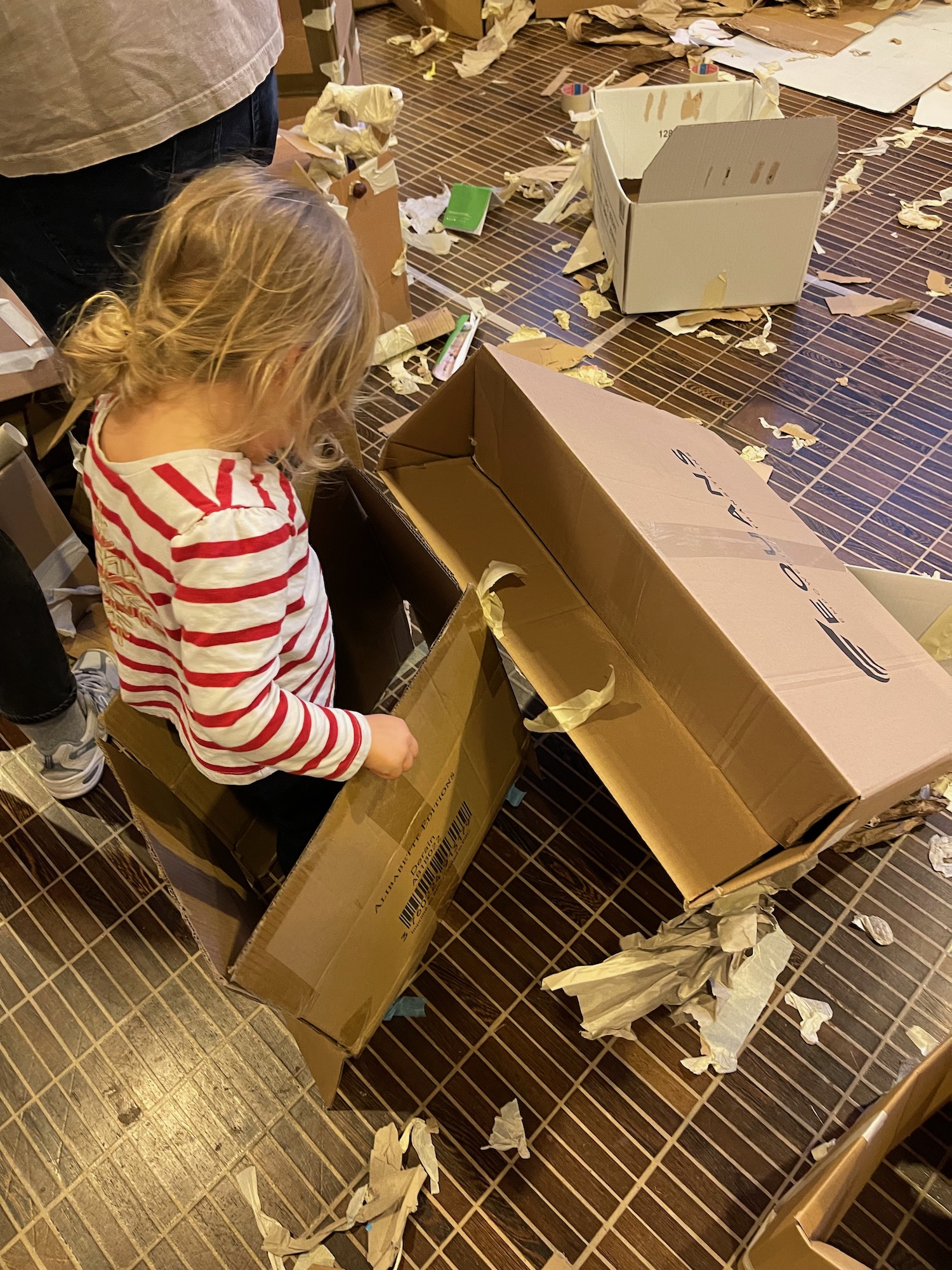 a child opening a box