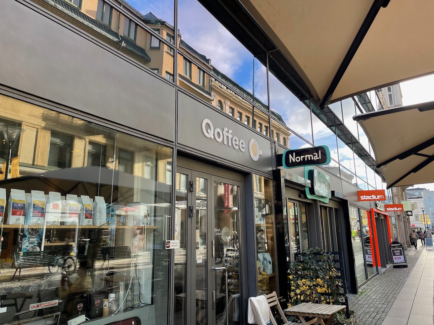 a storefront with a sign on the front